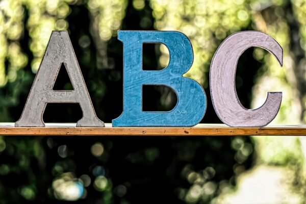 a group of the letters ABC on a shelf
